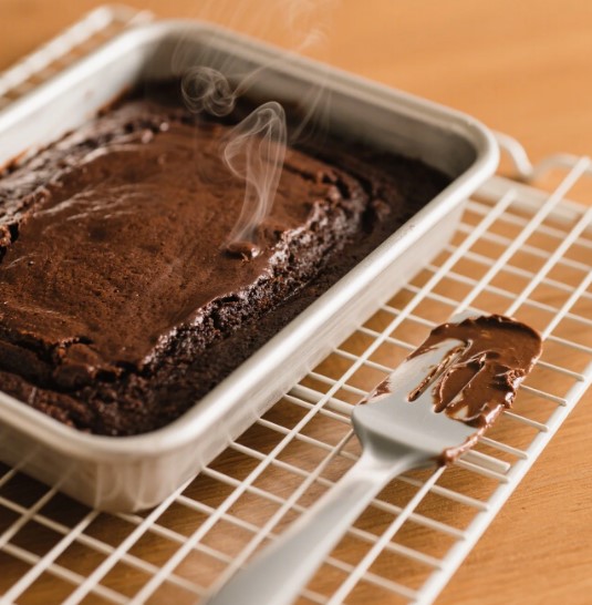 cooling chocolate diet coke cake in pan