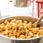 fresh batch of caramel popcorn in a kitchen bowl