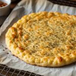 freshly baked cottage cheese flatbread with golden edges