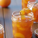 jars of peach jam rustic table