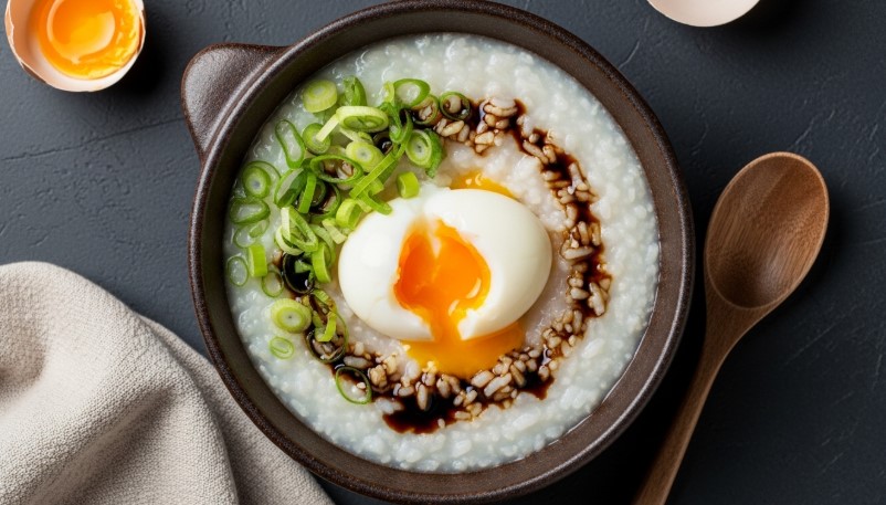 Asian-style congee with scallions and egg