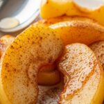 southern fried apples on serving plate with cinnamon glaze