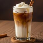 vanilla sweet cream cold foam on iced coffee with cinnamon