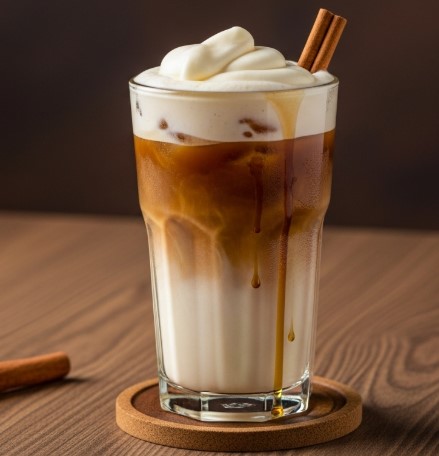 vanilla sweet cream cold foam on iced coffee with cinnamon
